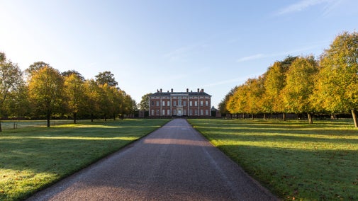 View of the tree-lined drive and the north front of Beningbrough Hall, Gallery and Gardens, North Yorkshire